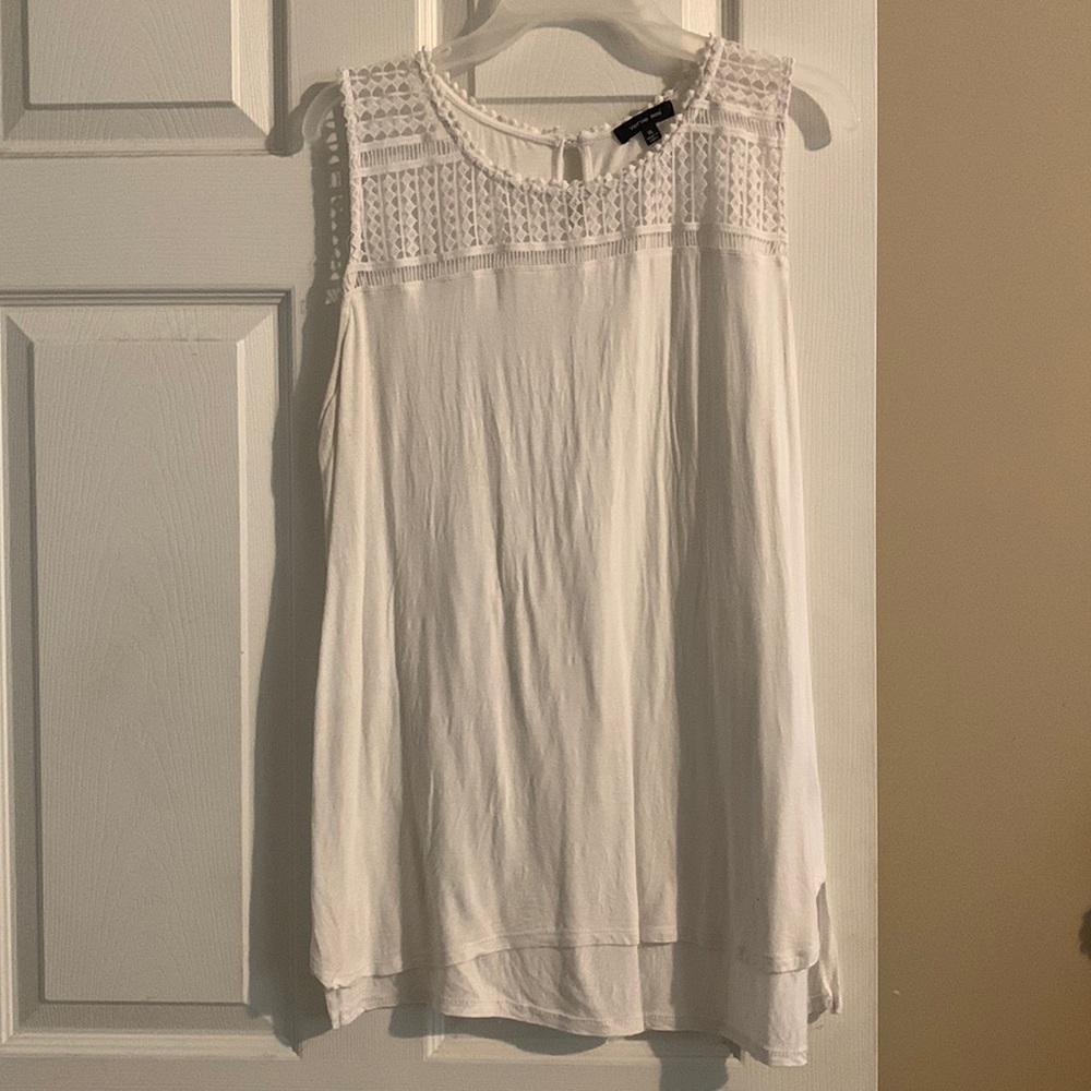 White sleeveless top
